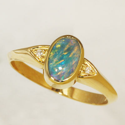 18k Yellow Gold Ring with two diamonds and a BLACK OPAL Sparkling bright orange and green over blue